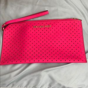 Michael Kors perforated clutch wristlet